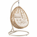 Poltrona sospesa 105x105x195 cm in fibra intrecciata beige con struttura in metallo per relax